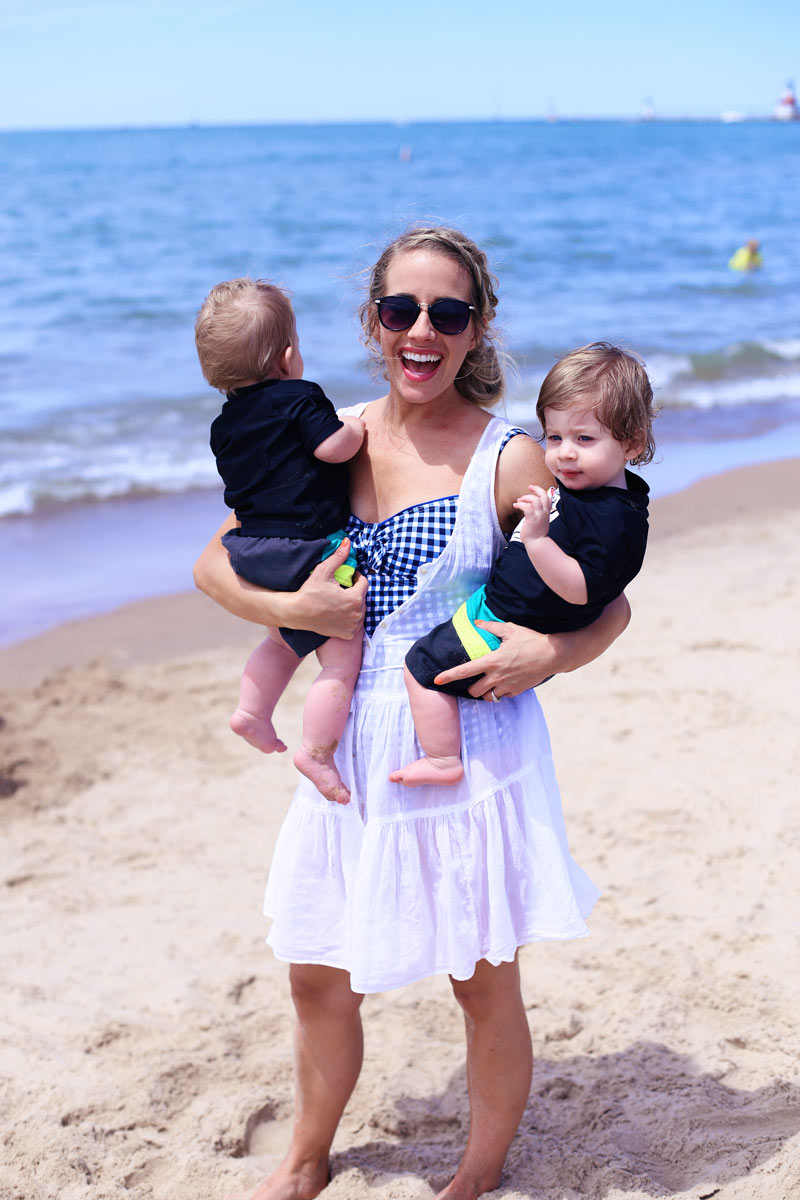 Family times. Abby holds the twins on the beach.