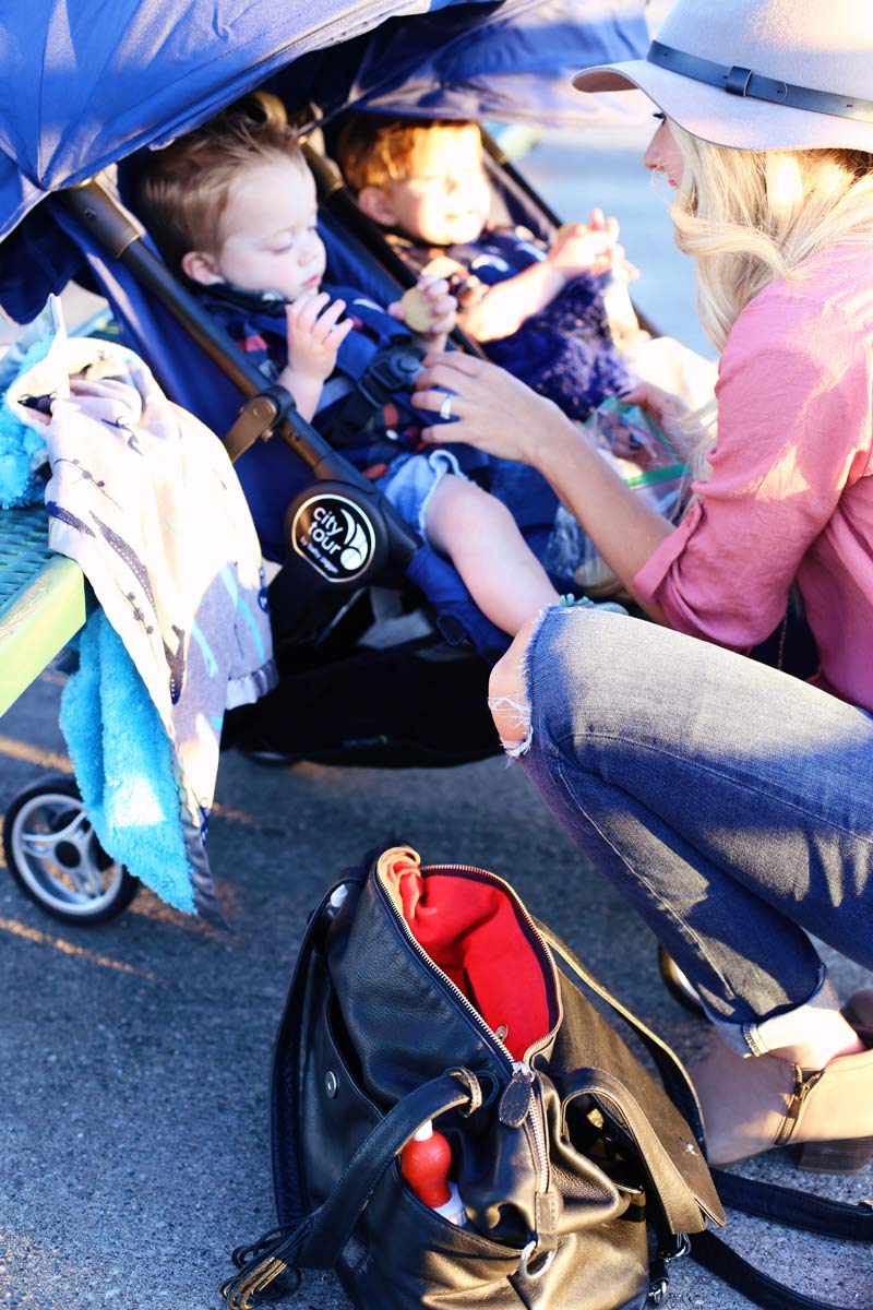 The twin are comfortable in their baby jogger City Tour strollers.