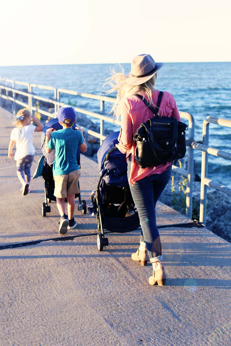 Lined up and strolling down the pier.