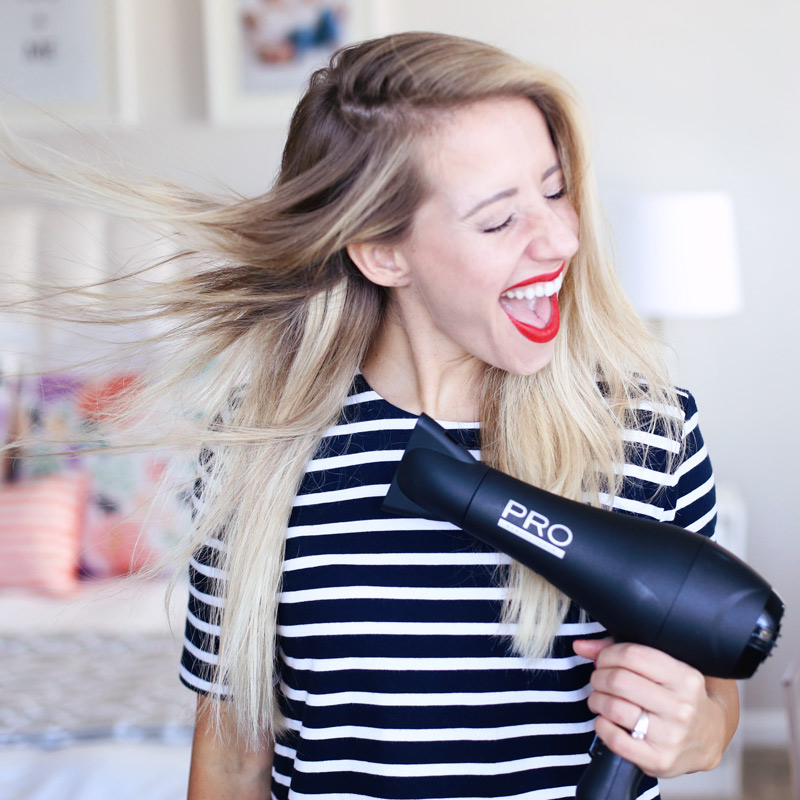 If you want to know how to blow dry your hair with a round brush, you need a good quality hair dryer. Find out more at Twist Me Pretty.