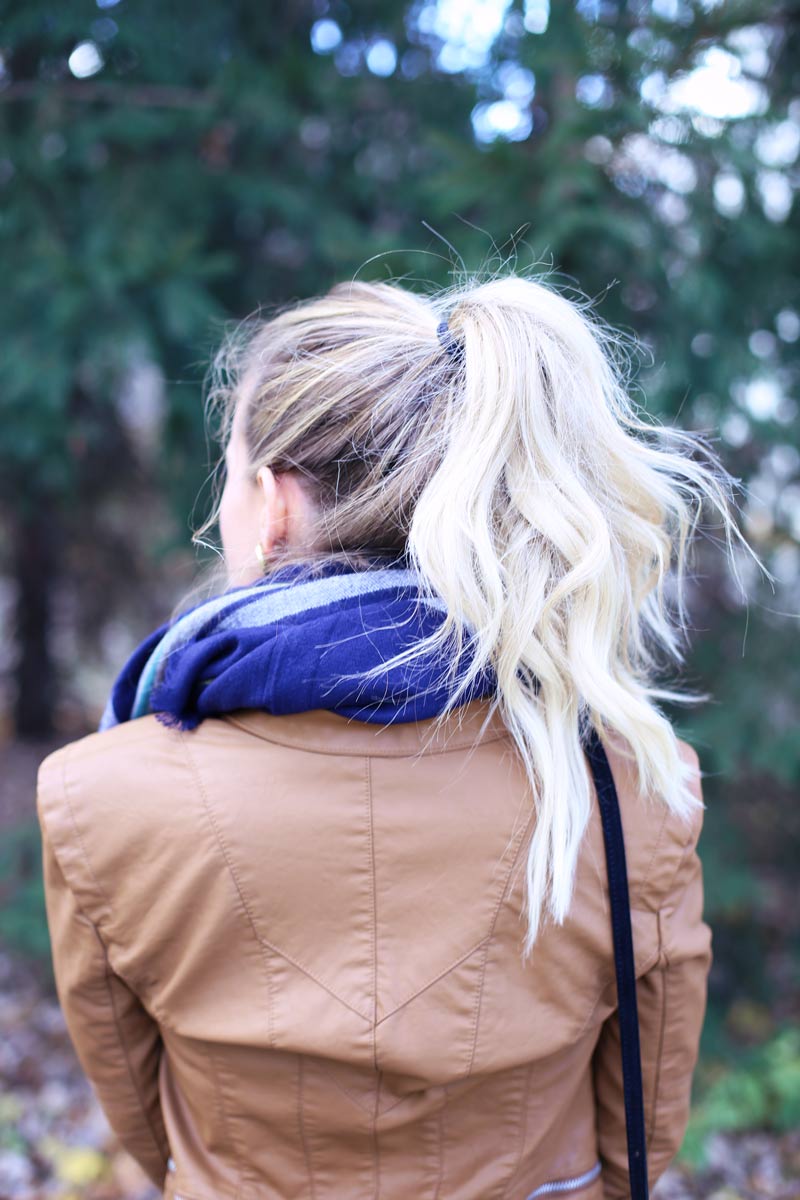 Abby's tan leather jacket is versatile - definitely a Thanksgiving outfit staple!