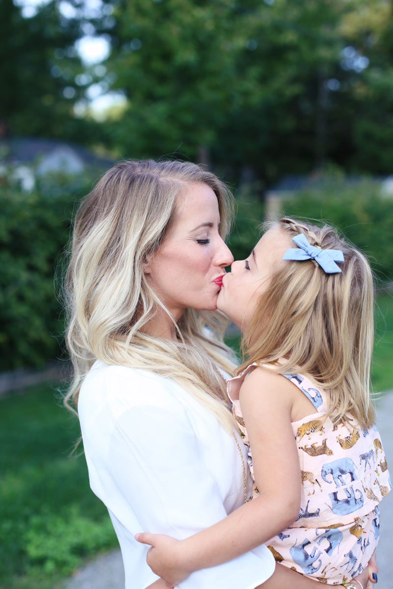 Mom and daughter kisses! Love your hair and teach your daughter to love herself.