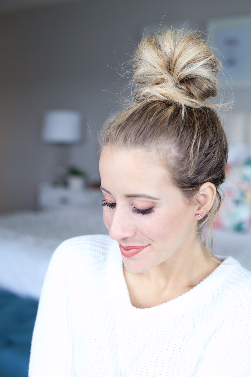 The french braided top knot tutorial guide from Twist Me Pretty