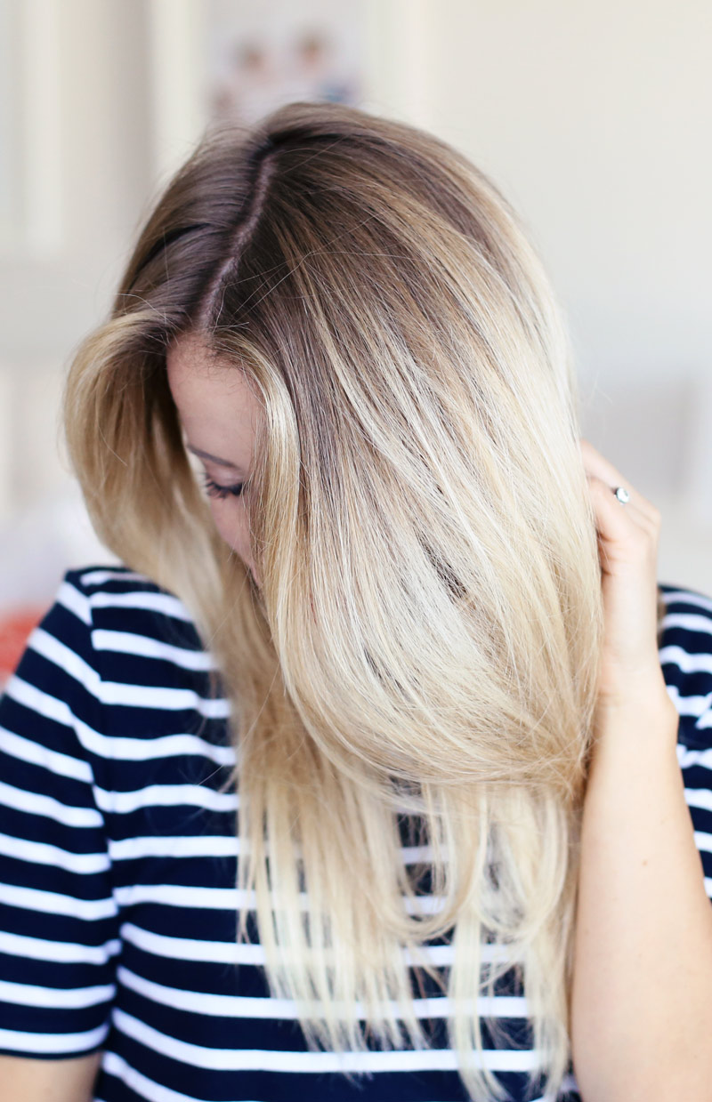 Volumnious, gorgeous hair... you can have it too! Find out how to dry your hair with a round brush at Twist Me Pretty.