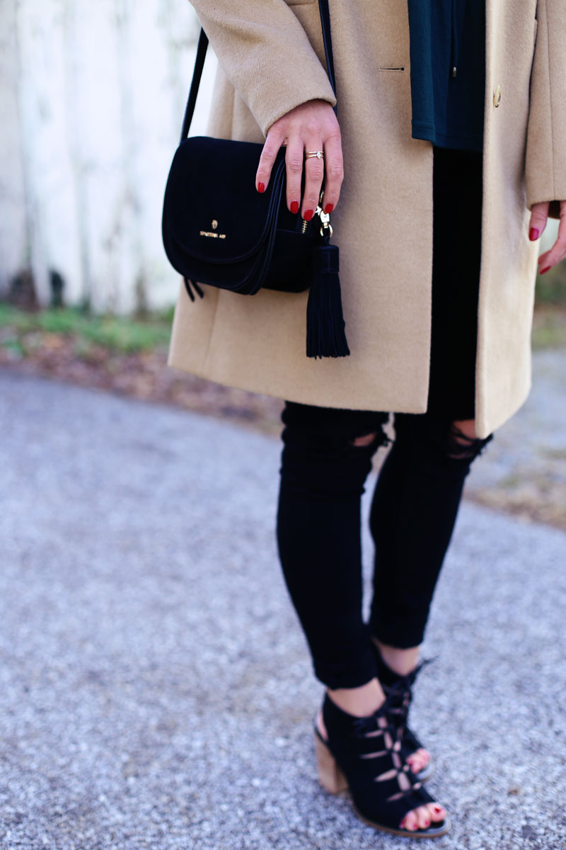 Abby's black bag, tan coat, black pants and wedge sandals pair flawlessly with her bell sleeves. Twist Me Pretty.