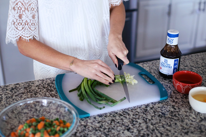 Chop your scallions for your Teriyaki Chicken Fried Rice