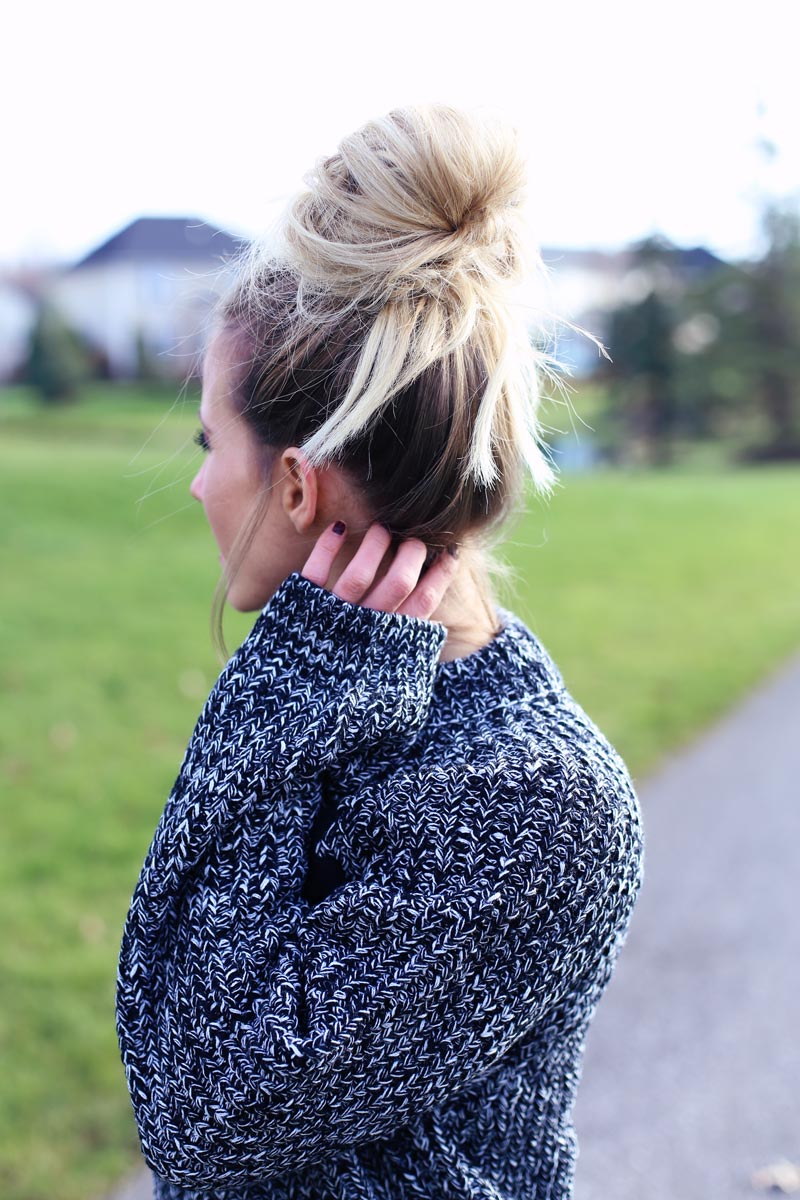 Comfortable, casual and chic - this big bun and oversized sweater look is perfect for the weekend.