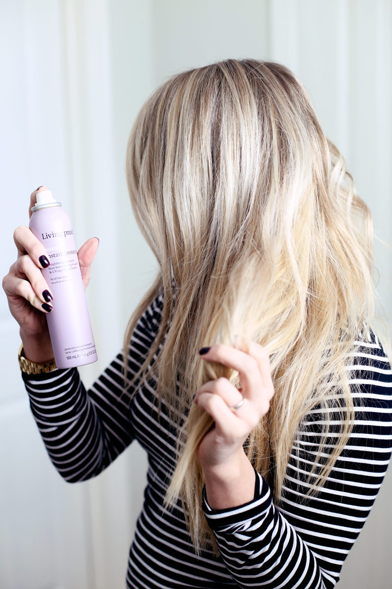 Abby finishes off her hairstyle with Living proof's Restore Instant Protection spray