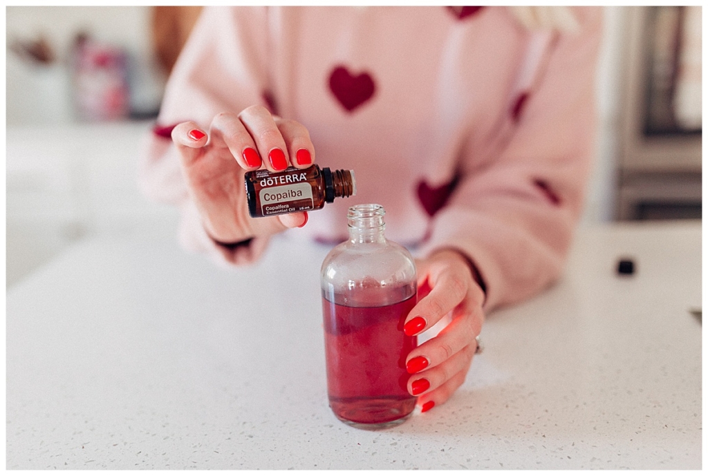 DIY Rose water how to use your leftover roses from valentines day using essential oils with twistmepretty.com a step by step guide