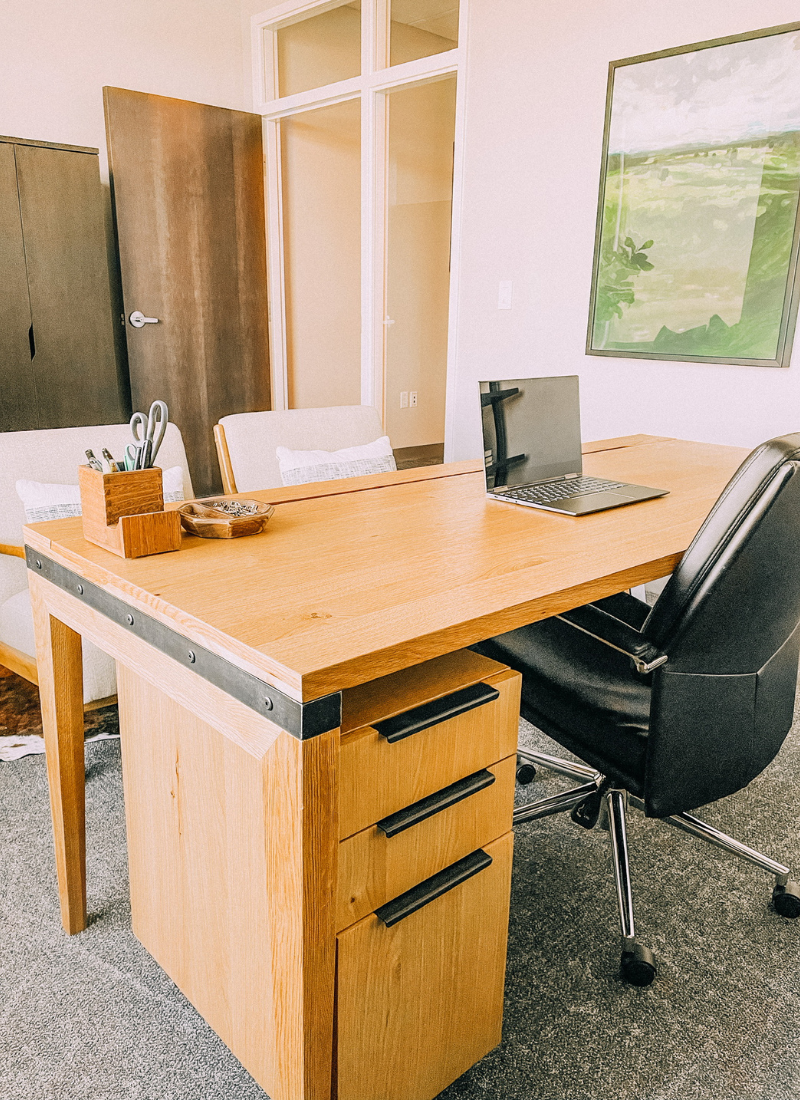 The desk has hidden storage that Matt loves. www.twistmepretty.com