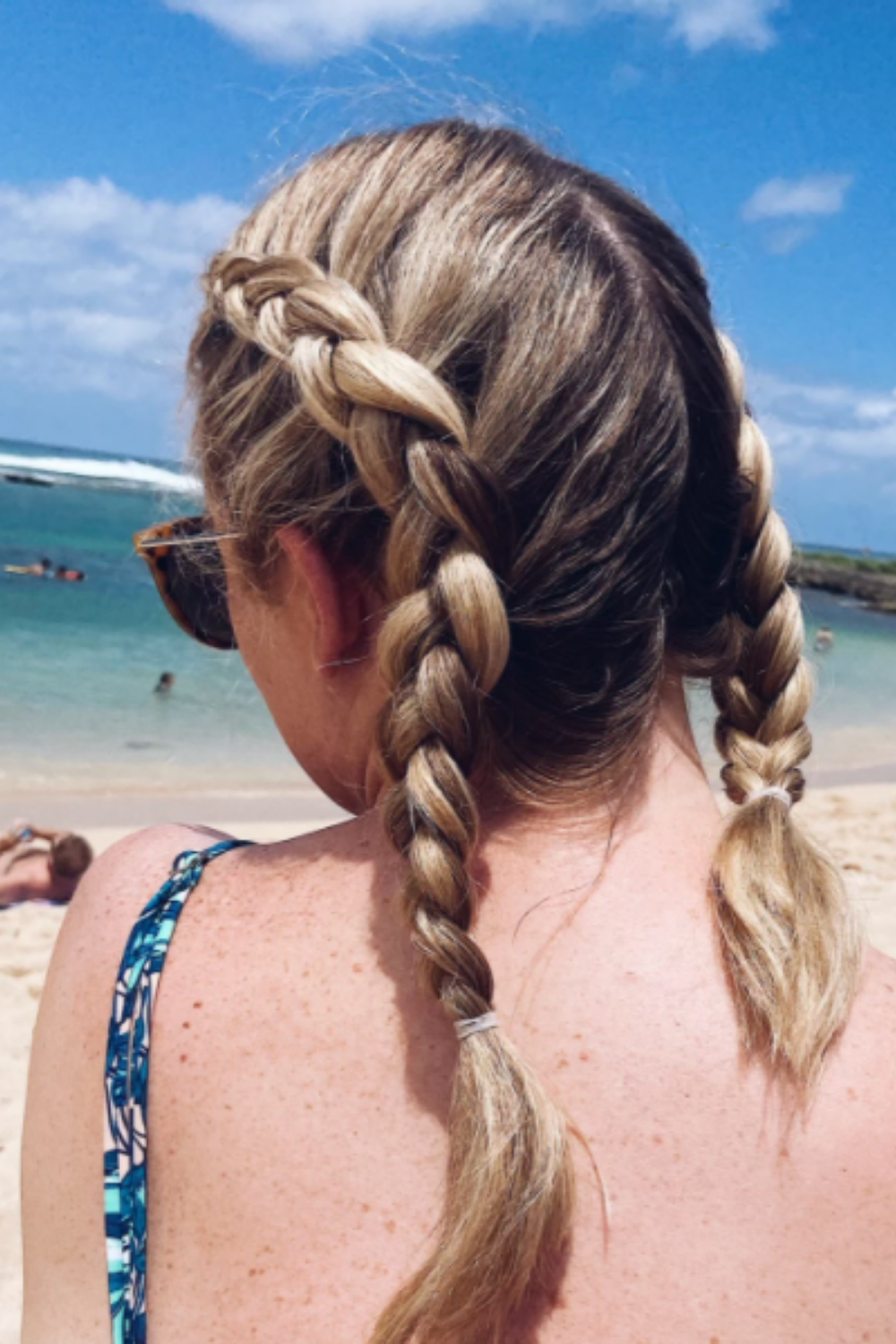 Braiding your hair will keep it from getting tangles and in the way while laying out and playing on the beach. www.twistmepretty.com